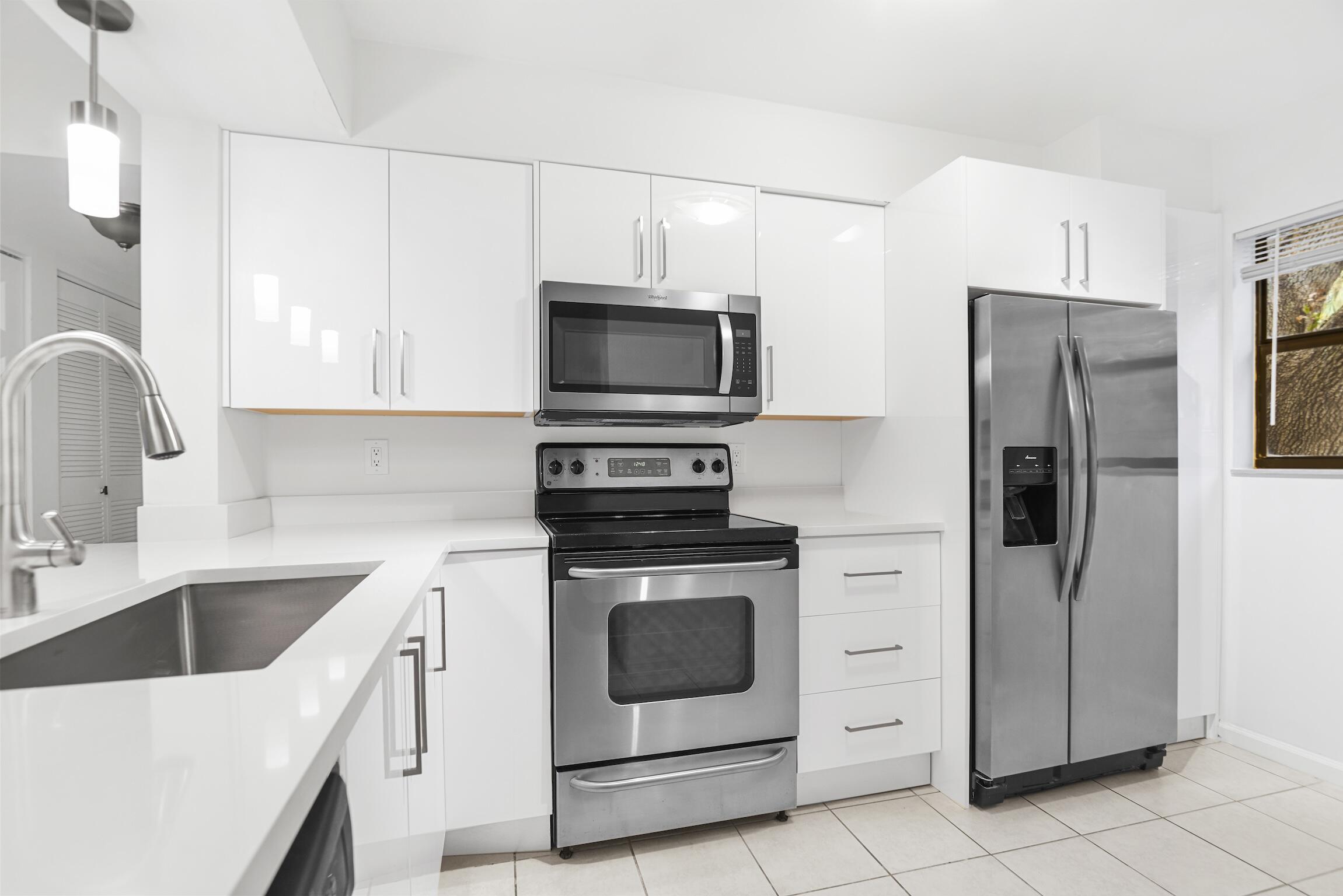 3129 Millwood Terrace, Unit M137 Boca Raton, FL 33431 - Photo 6 of 58 Kitchen