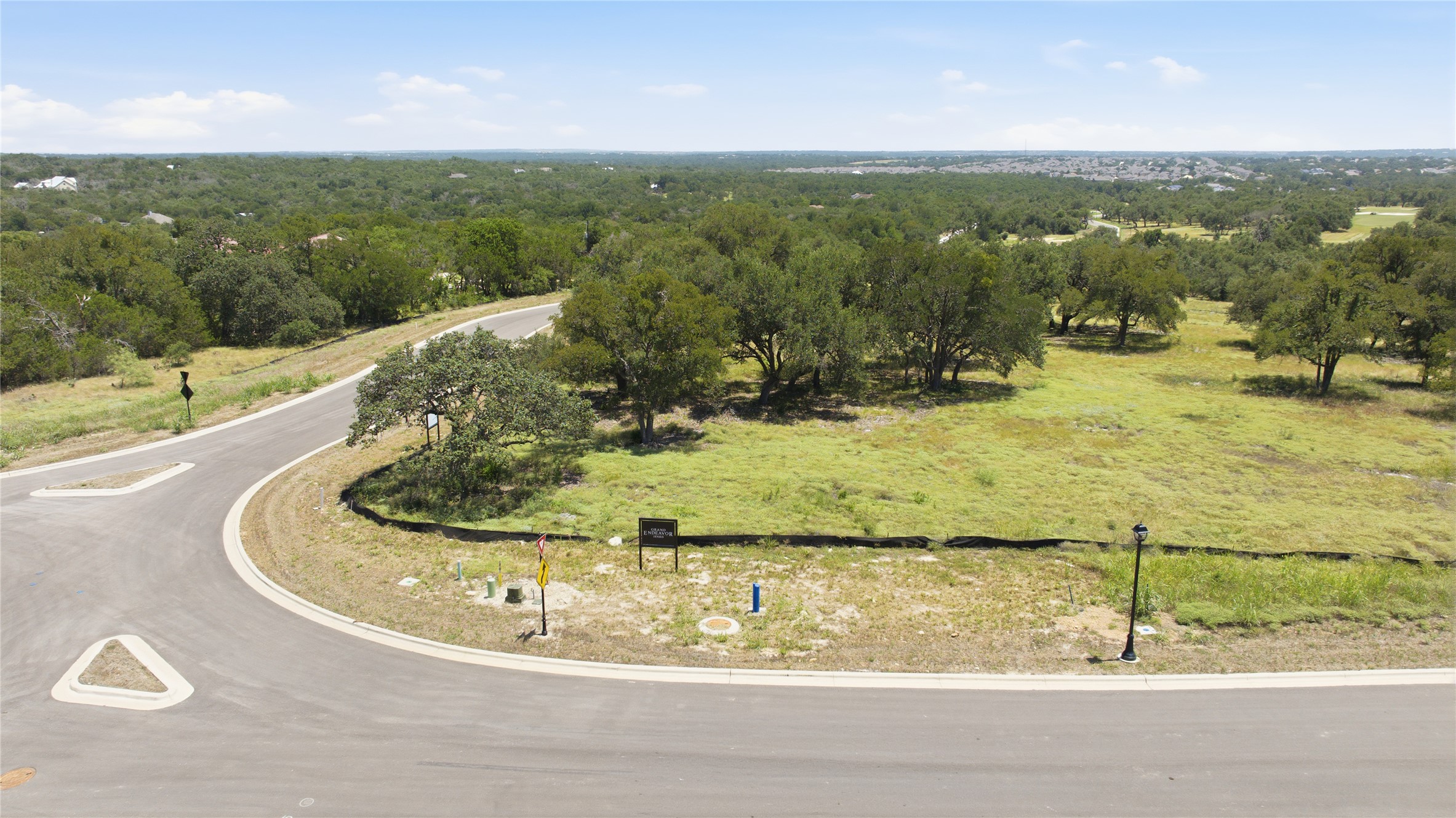 201 Lightning Rnch Road Georgetown, TX 78628 - Photo 1 of 7 A verdant, buildable lot offers scenic views and a prime location for a custom home.