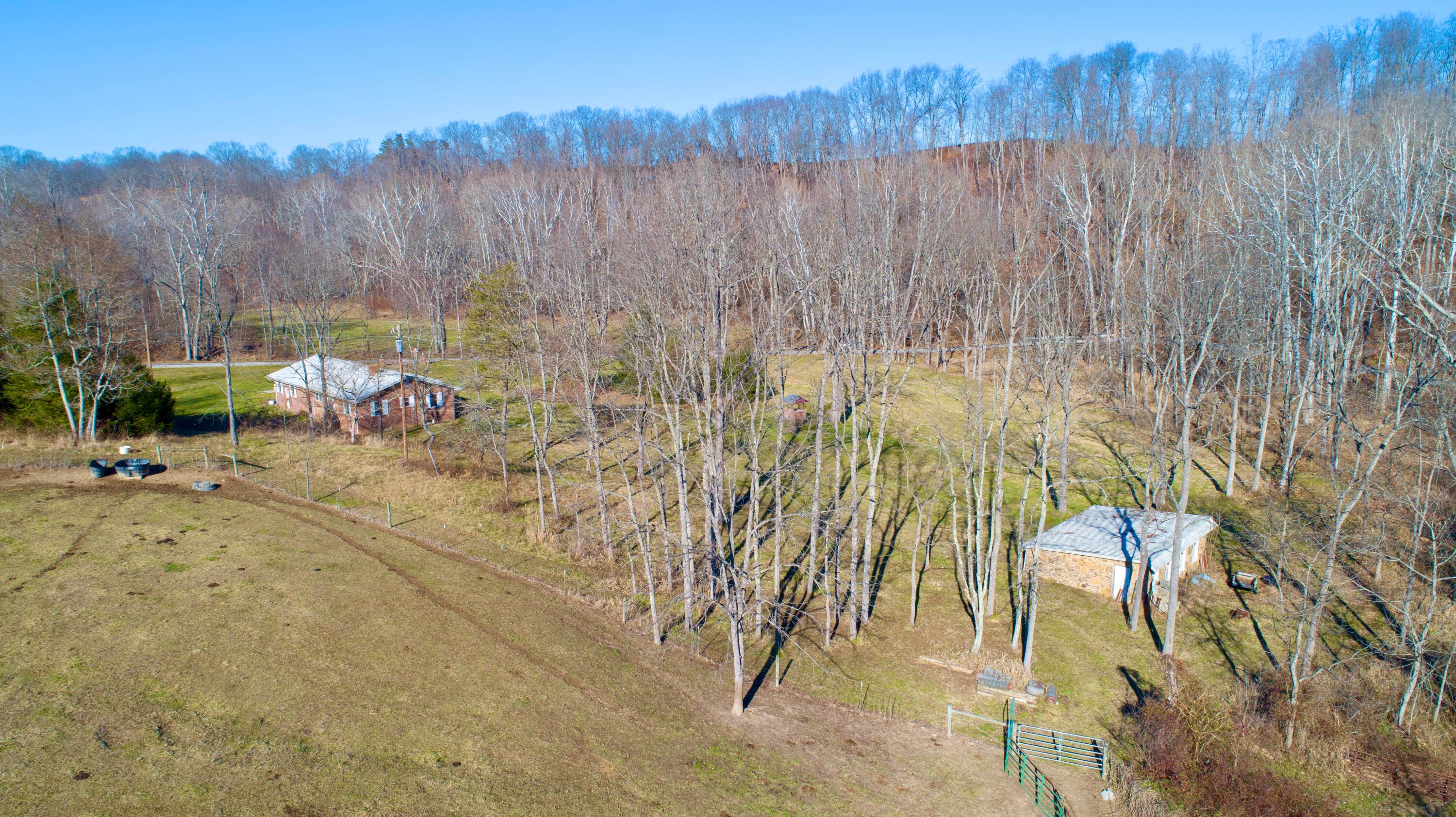 1368 Allen Road Beaver, OH 45613 - Photo 73 of 77 A view of the house and outbuilding from the hill pasture.