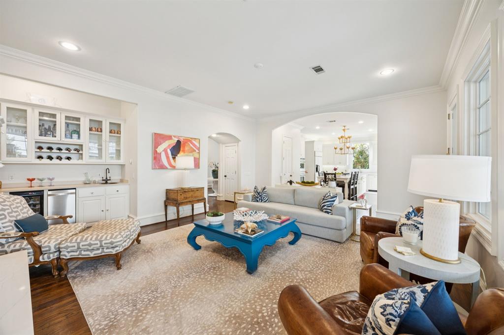 7423 Marquette Street Dallas, TX 75225 - Photo 11 of 31 This view shows the wet bar with wine refrigerator, ice maker and sink.