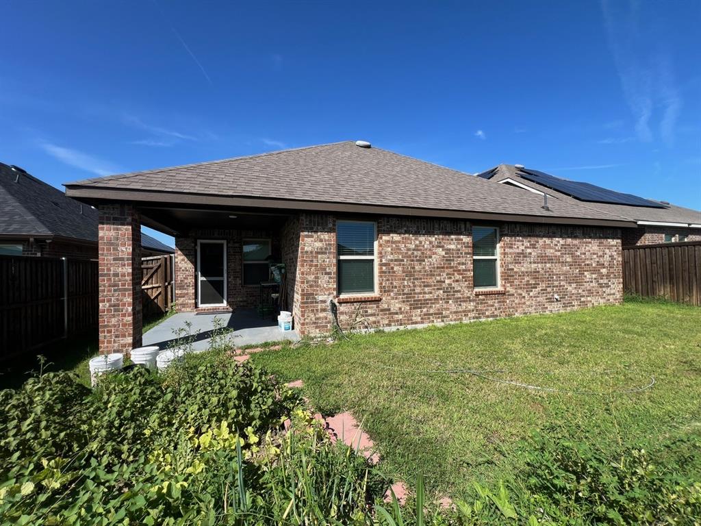 3113 Glazner Drive Forney, TX 75126 - Photo 23 of 24 a front view of a house with a garden