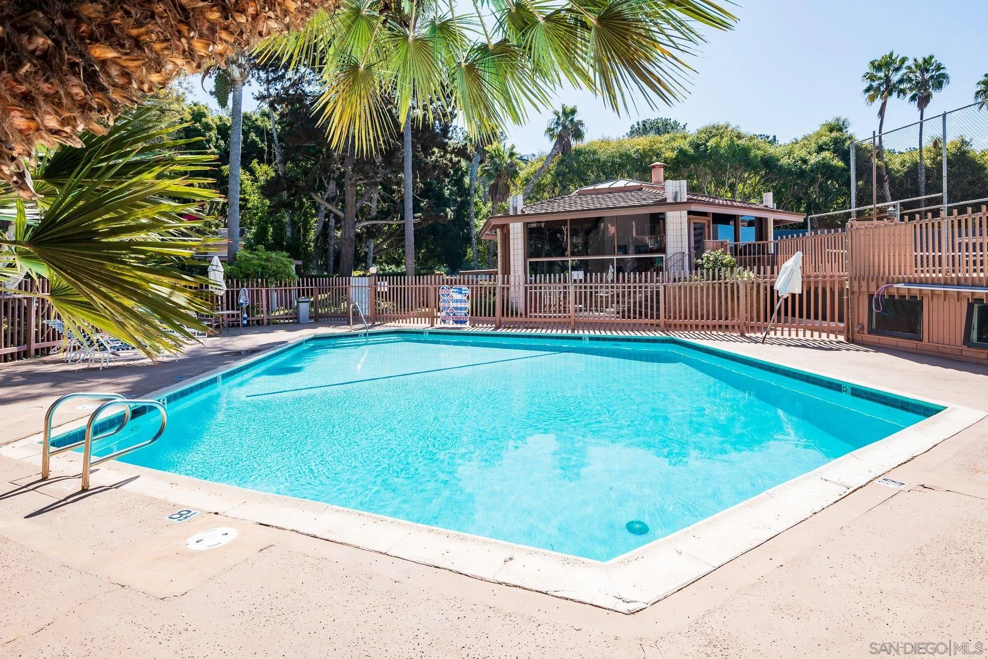 2610 Torrey Pines Road, Unit C33 La Jolla, CA 92037 - Photo 18 of 24 a view of a swimming pool with a patio