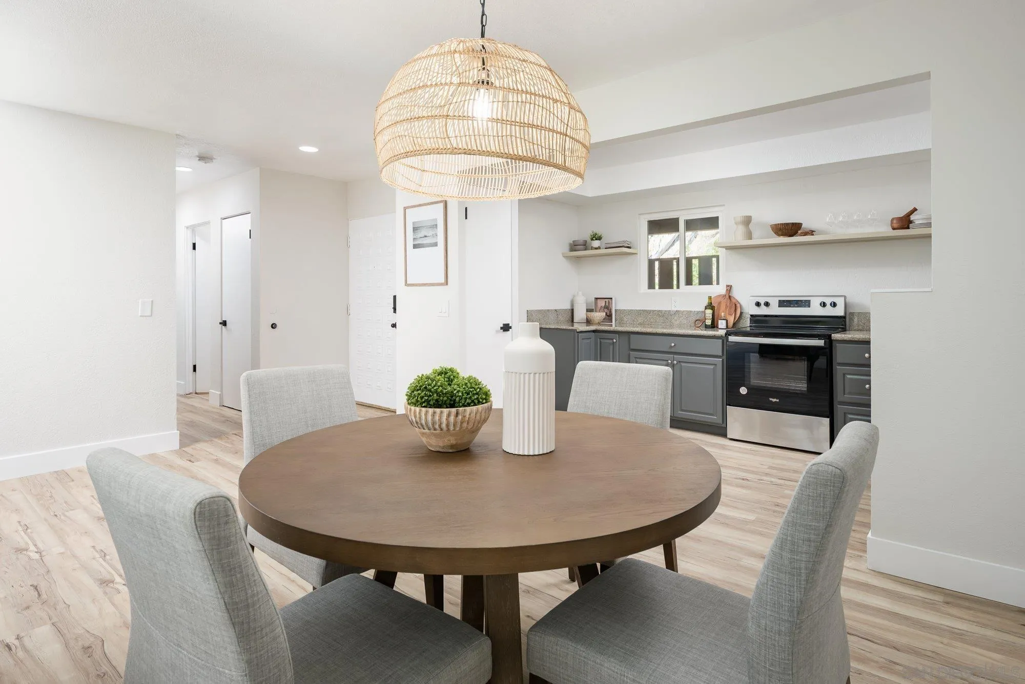 2610 Torrey Pines Road, Unit C33 La Jolla, CA 92037 - Photo 4 of 24 a view of a dining room with furniture