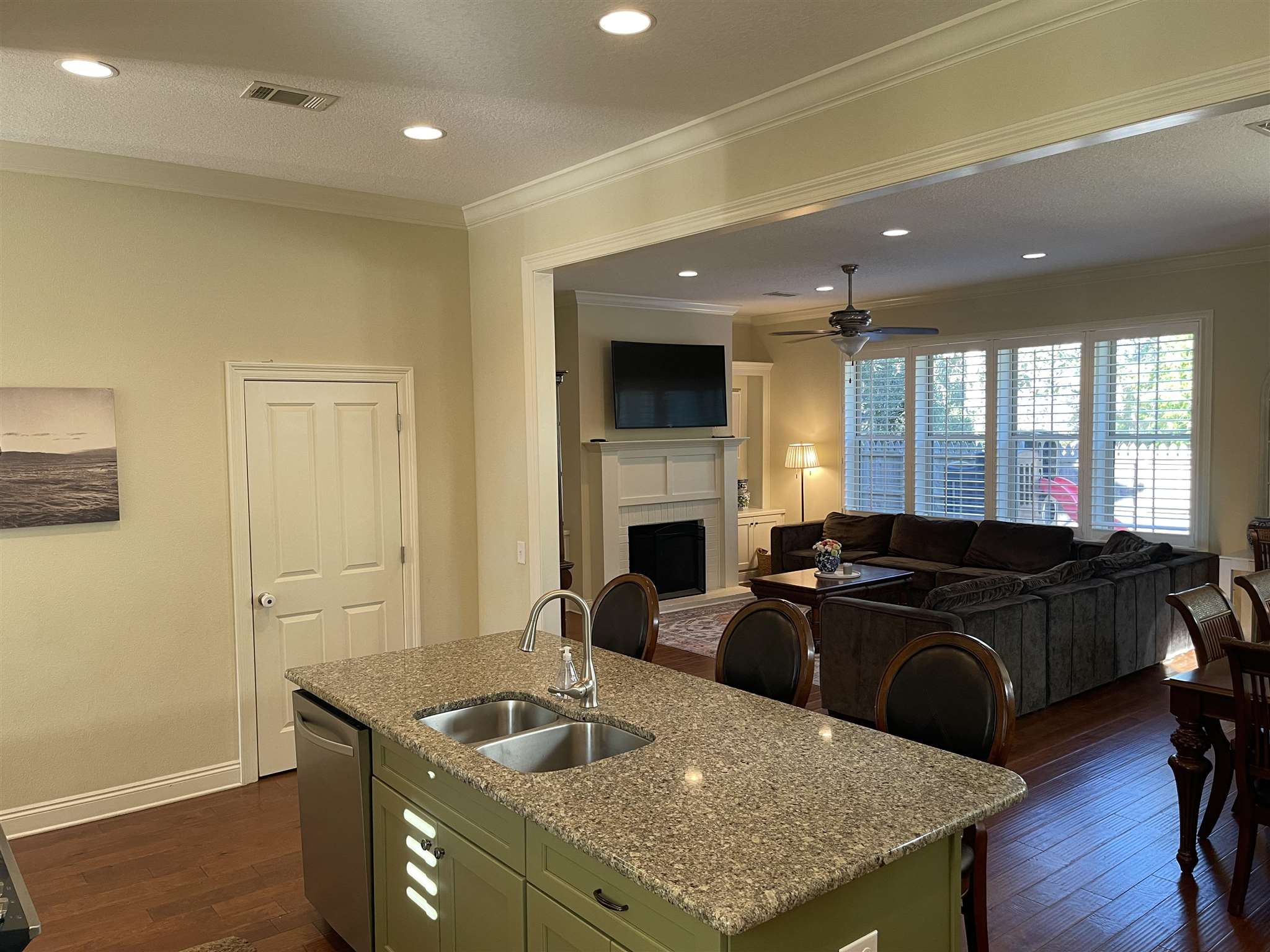 10692 Squall Line Road Pensacola, FL 32507 - Photo 11 of 29 a kitchen with sink refrigerator and cabinets