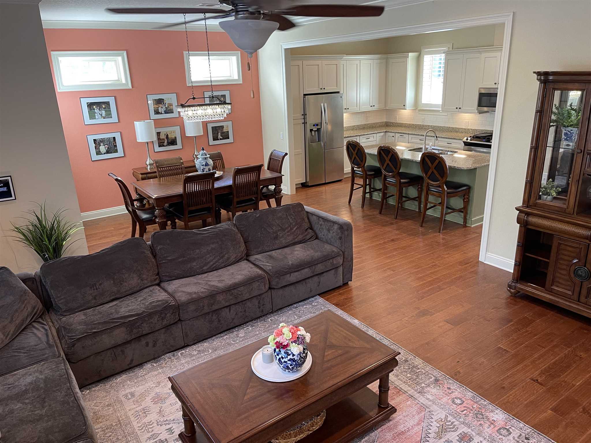 10692 Squall Line Road Pensacola, FL 32507 - Photo 12 of 29 a living room with furniture and wooden floor