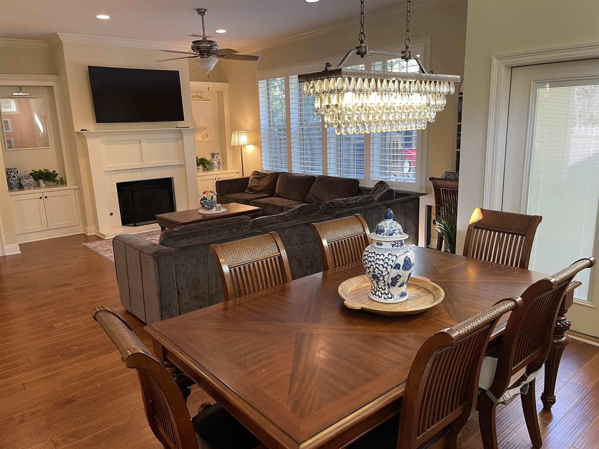10692 Squall Line Road Pensacola, FL 32507 - Photo 13 of 29 a view of a dining room with furniture window and wooden floor