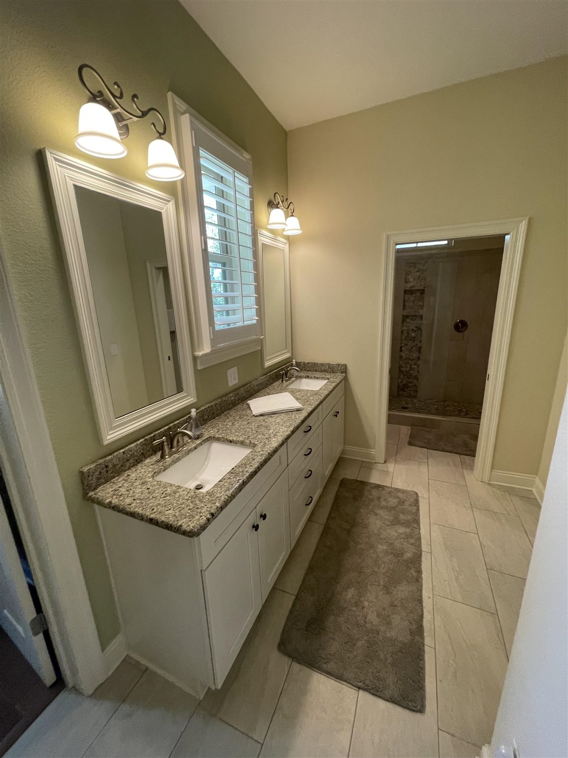 10692 Squall Line Road Pensacola, FL 32507 - Photo 15 of 29 a bathroom with a granite countertop sink and a mirror