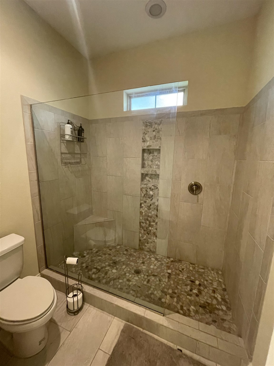 10692 Squall Line Road Pensacola, FL 32507 - Photo 16 of 29 a bathroom with a shower and a toilet