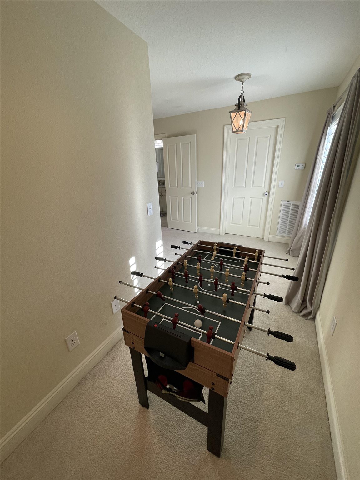 10692 Squall Line Road Pensacola, FL 32507 - Photo 27 of 29 a view of a room with wooden floor