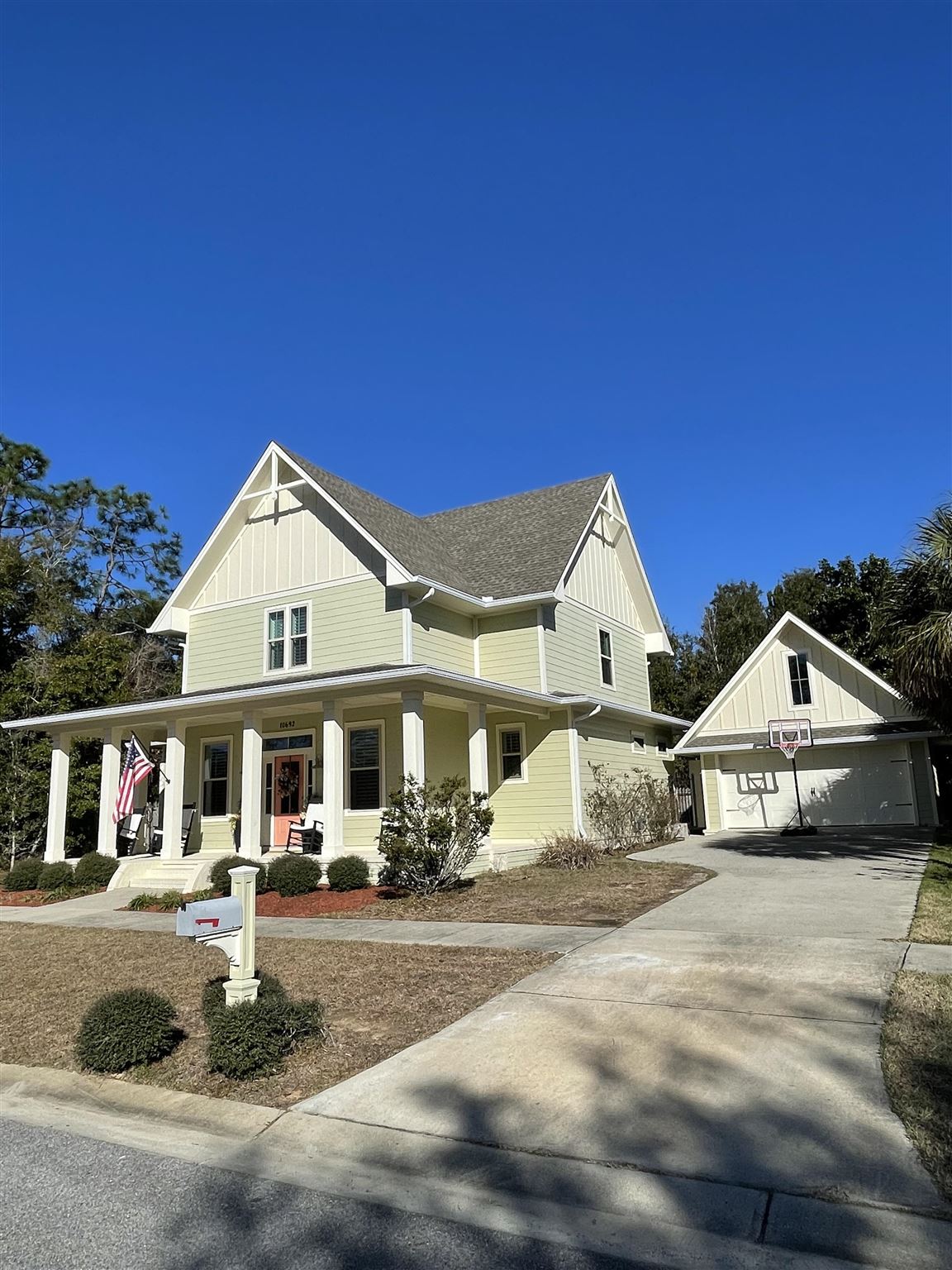 10692 Squall Line Road Pensacola, FL 32507 - Photo 3 of 29 a front view of a house with a yard