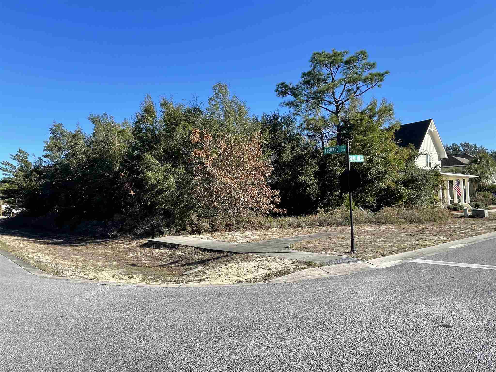 10692 Squall Line Road Pensacola, FL 32507 - Photo 5 of 29 a view of a house with a tree