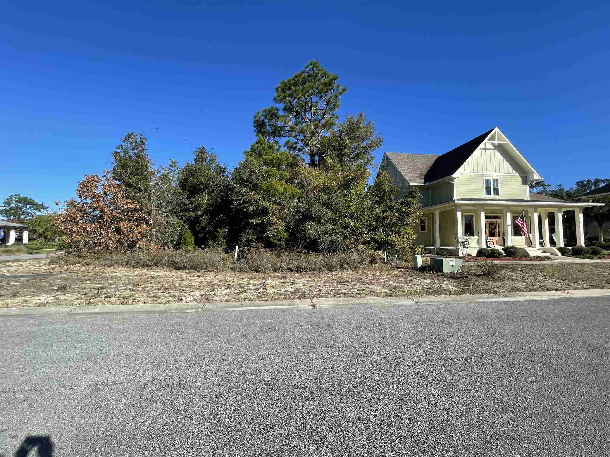 10692 Squall Line Road Pensacola, FL 32507 - Photo 6 of 29 a front view of a house with a yard