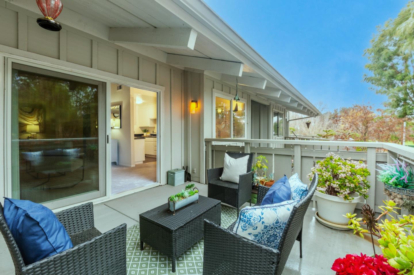 255 South Rengstorff Avenue, Unit 96 Mountain View, CA 94040 - Photo 1 of 20 a outdoor living space with furniture and a potted plant