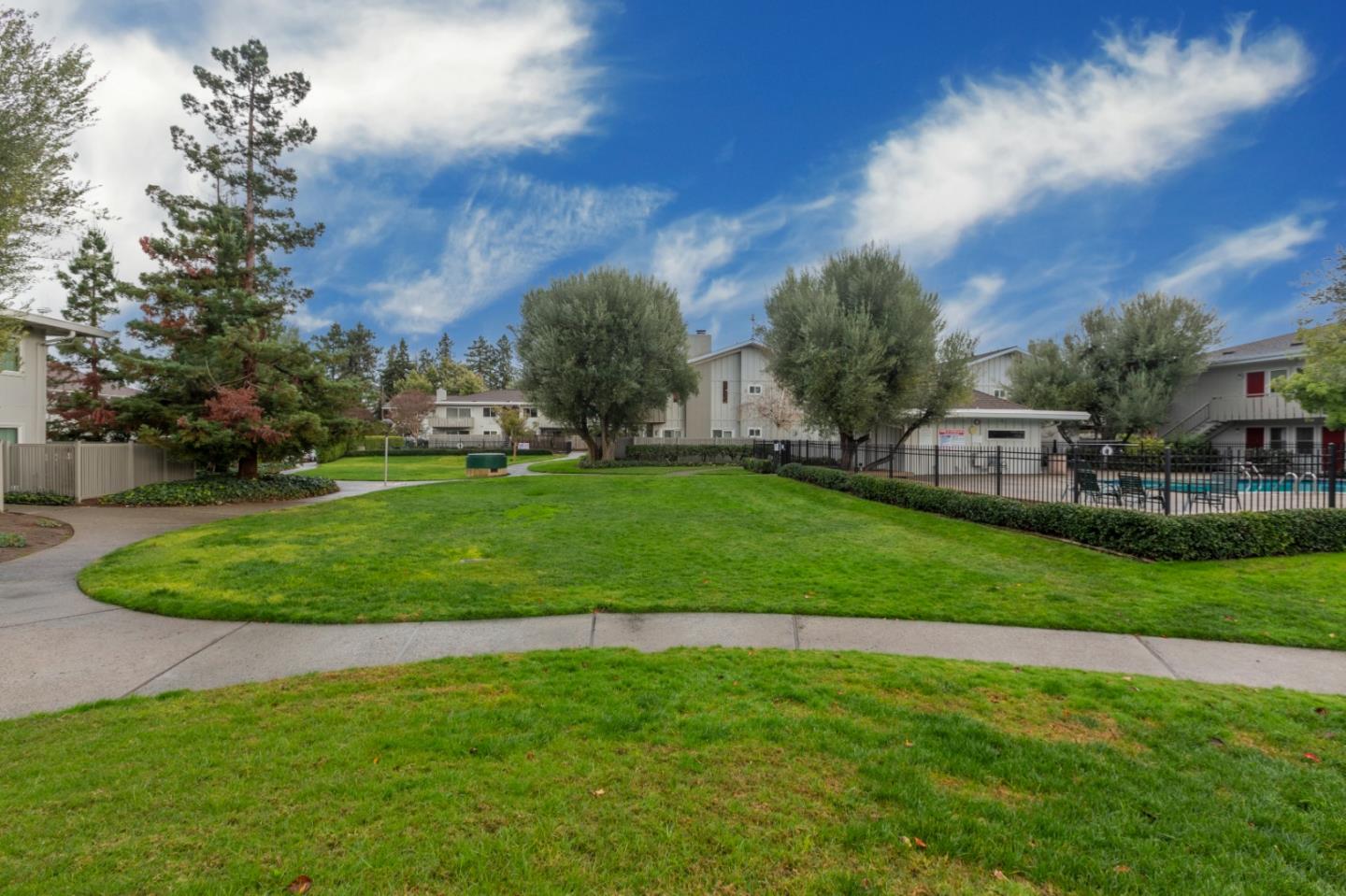 255 South Rengstorff Avenue, Unit 96 Mountain View, CA 94040 - Photo 17 of 20 a view of a park with large trees