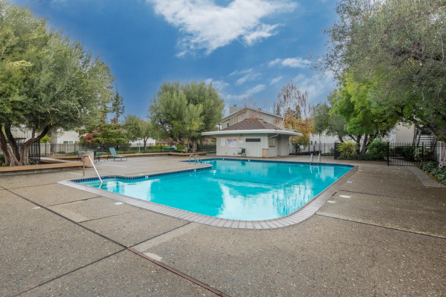 255 South Rengstorff Avenue, Unit 96 Mountain View, CA 94040 - Photo 19 of 20 a view of a swimming pool with a yard