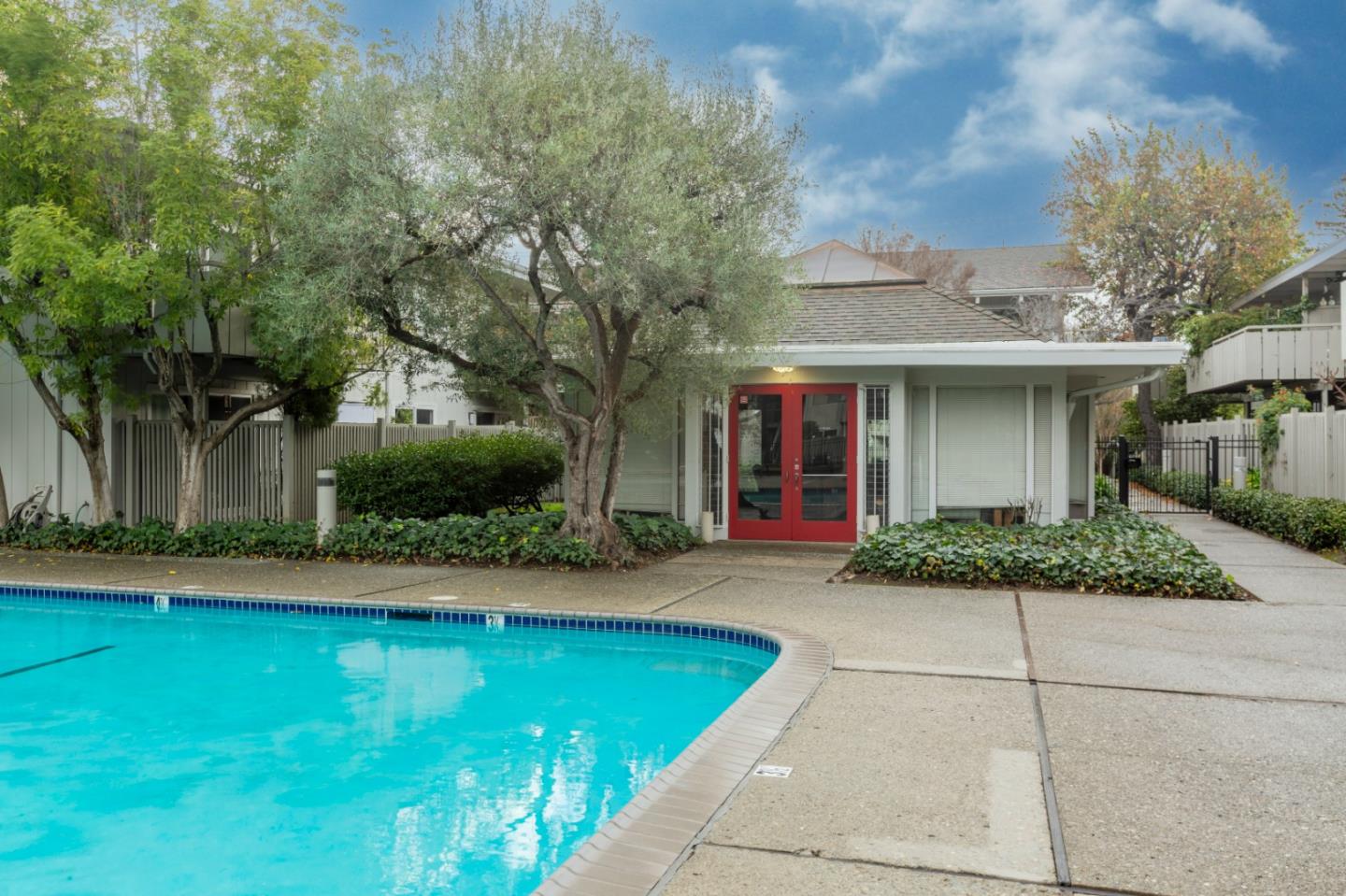 255 South Rengstorff Avenue, Unit 96 Mountain View, CA 94040 - Photo 20 of 20 a front view of a house with garden