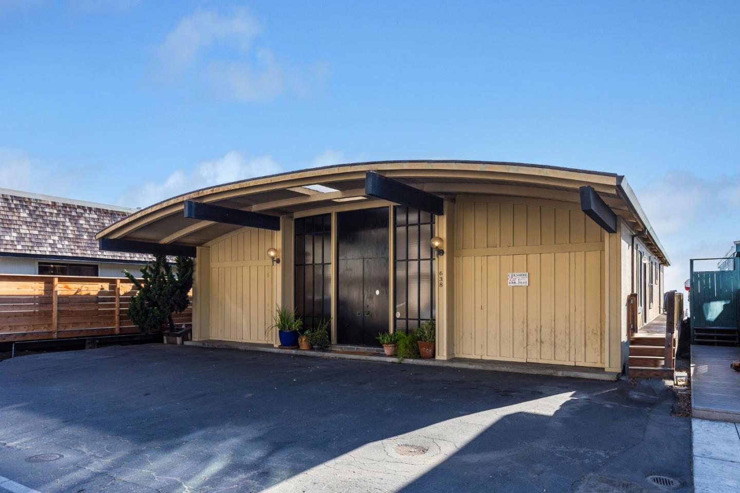 638 Beach Drive Aptos, CA 95003 - Photo 16 of 40 a front view of a house with garage