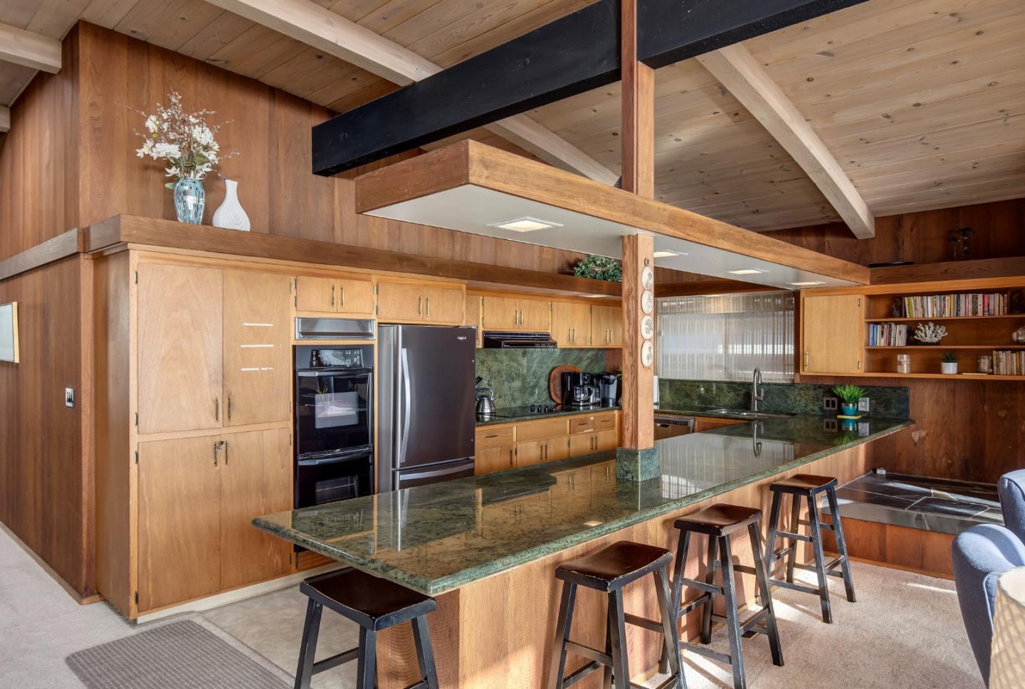 638 Beach Drive Aptos, CA 95003 - Photo 21 of 40 a dining room with furniture and chandelier