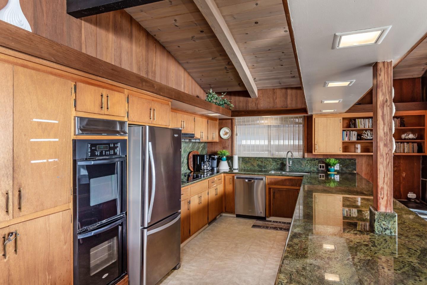 638 Beach Drive Aptos, CA 95003 - Photo 23 of 40 a kitchen with stainless steel appliances granite countertop a refrigerator a oven and a stove