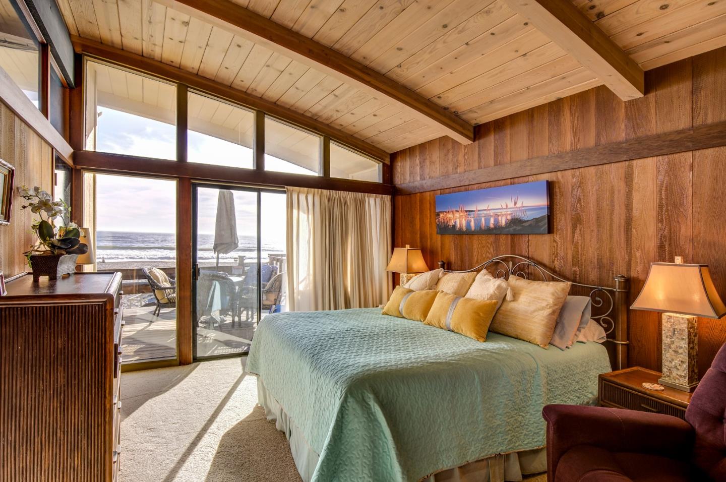 638 Beach Drive Aptos, CA 95003 - Photo 24 of 40 a bedroom with a bed and a large window