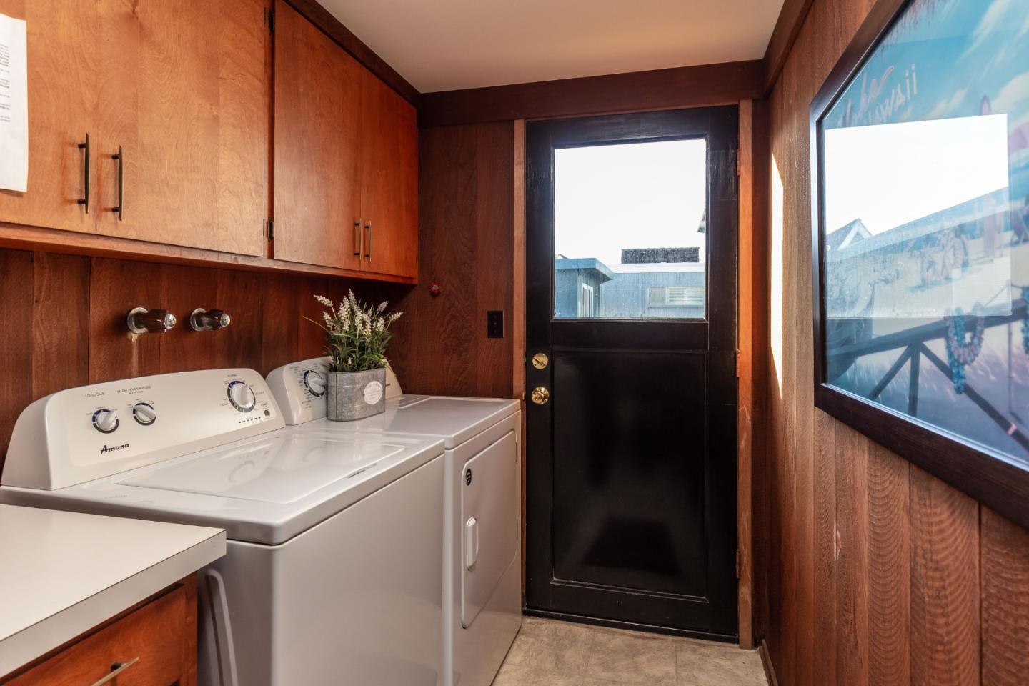 638 Beach Drive Aptos, CA 95003 - Photo 34 of 40 a utility room with dryer and washer