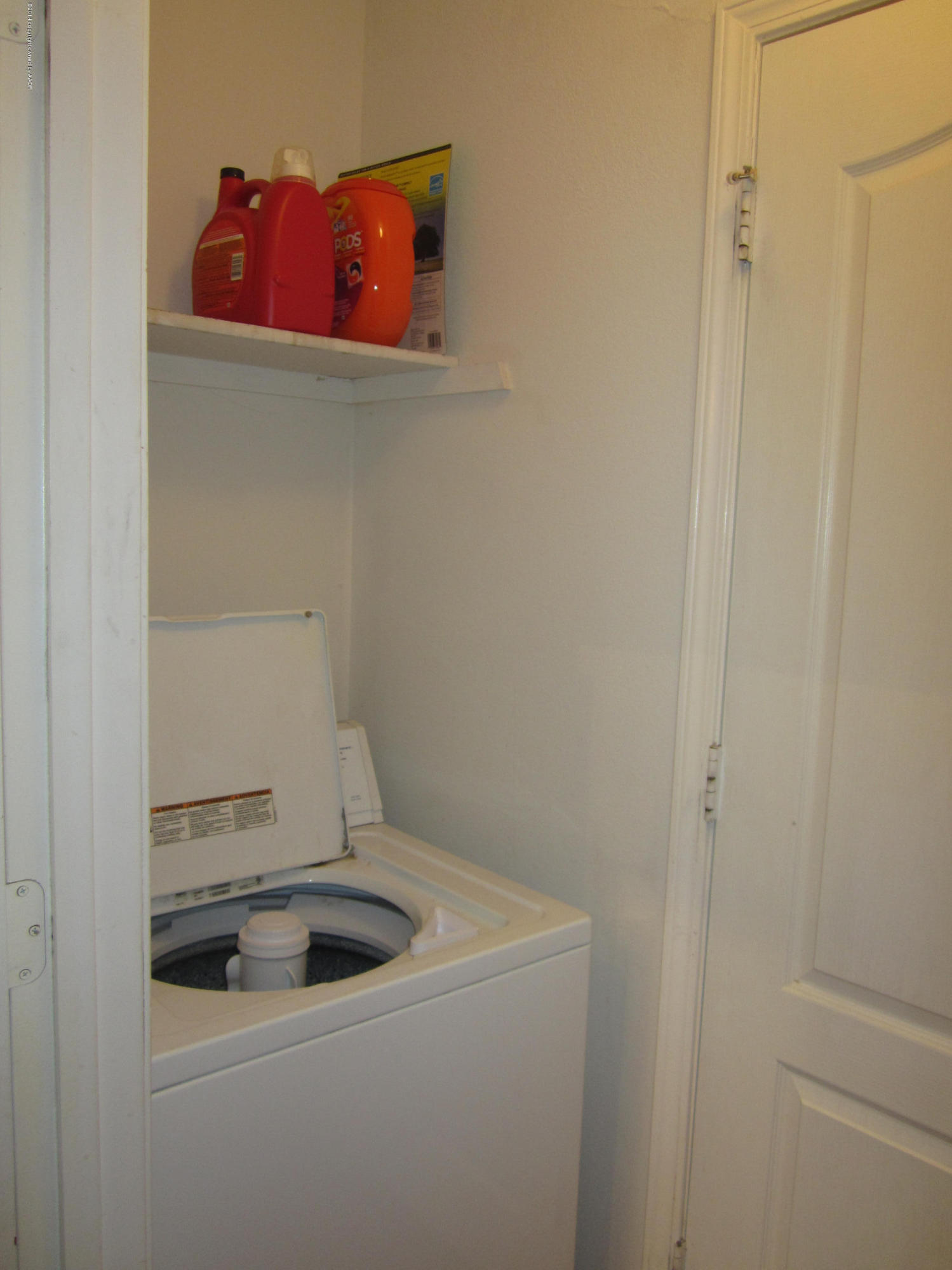 4724 Capulin Lane Amarillo, TX 79110 - Photo 12 of 23 a bathroom with a sink and vanity