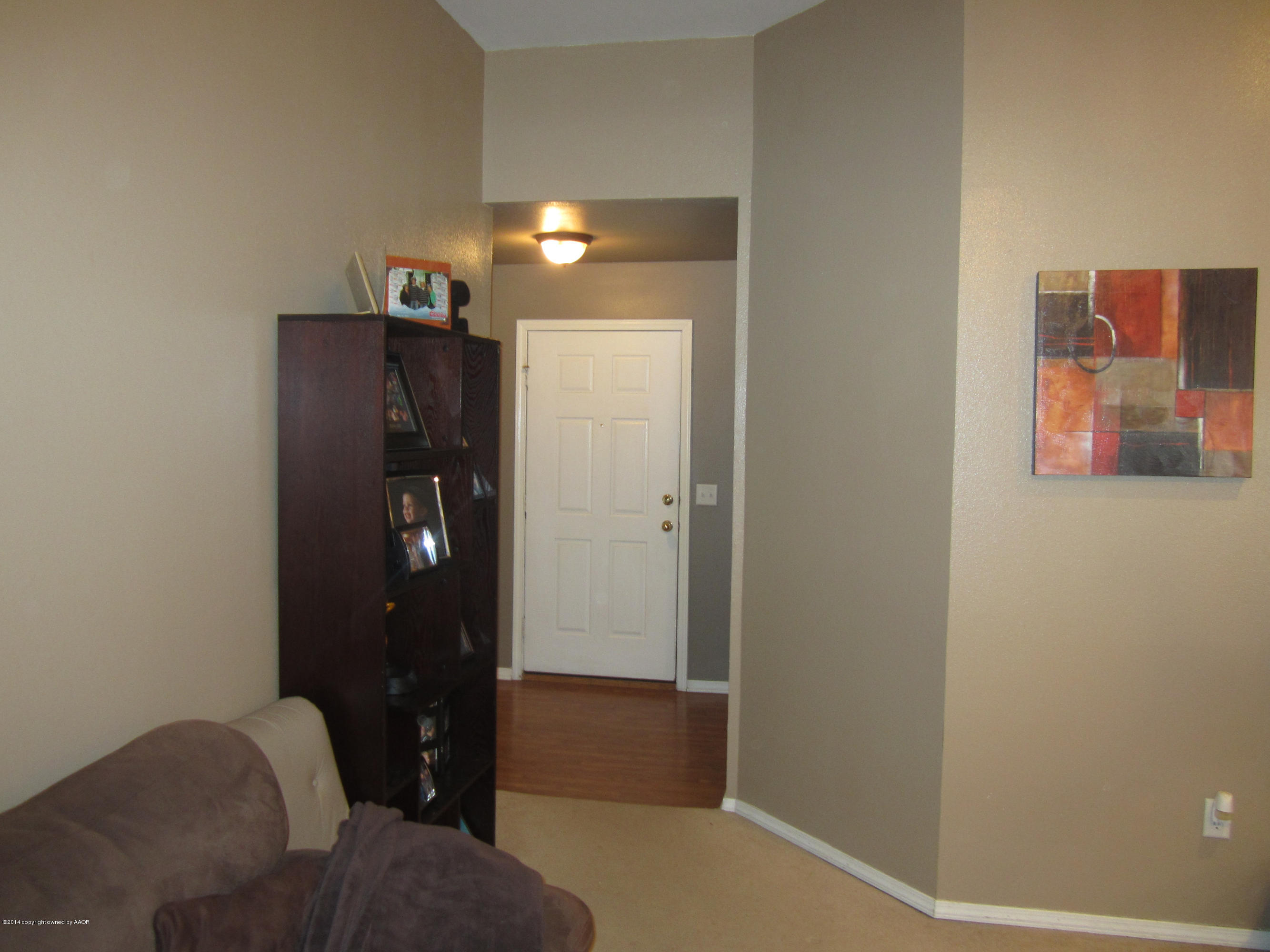 4724 Capulin Lane Amarillo, TX 79110 - Photo 3 of 23 a bathroom with a sink and a mirror
