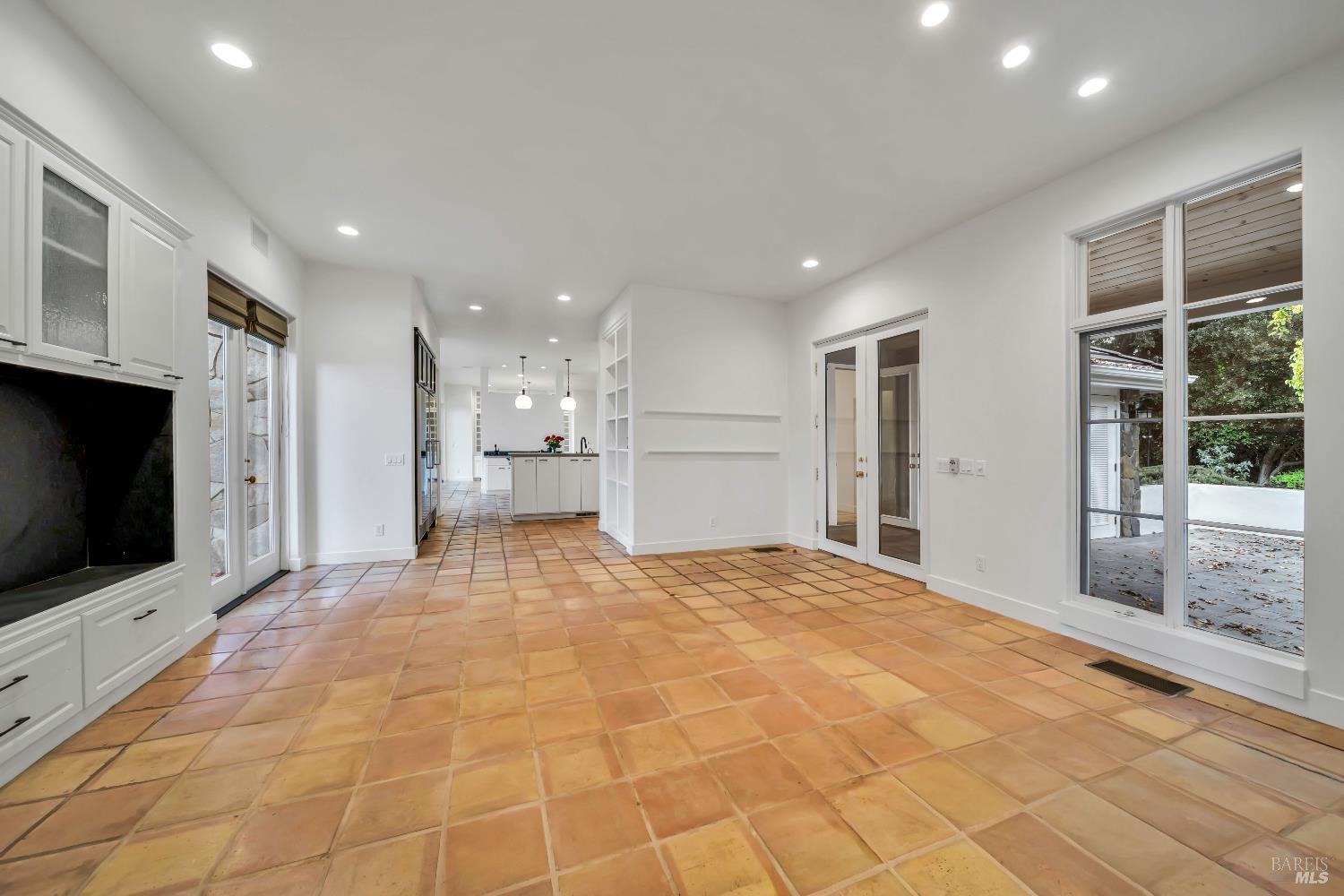 1041 Las Amigas Road Napa, CA 94559 - Photo 12 of 46 a large bedroom with a bed and a flat screen tv