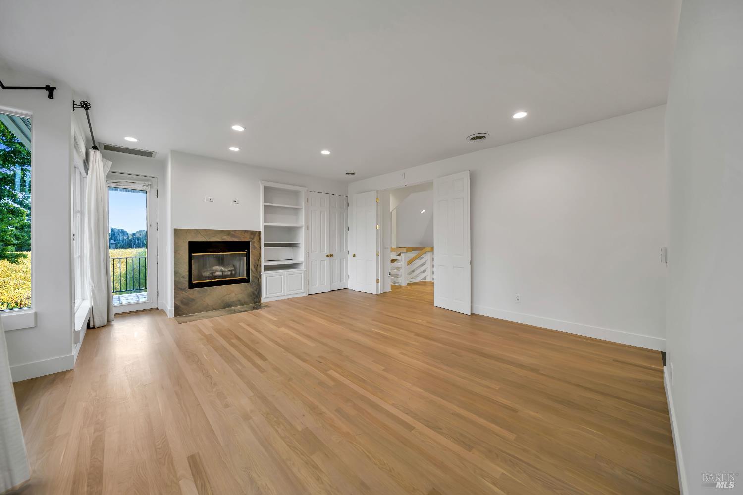 1041 Las Amigas Road Napa, CA 94559 - Photo 25 of 46 a view of an empty room with a fireplace