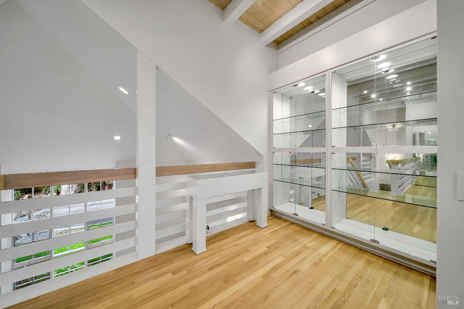 1041 Las Amigas Road Napa, CA 94559 - Photo 26 of 45 Upstairs Loft with Glass Cases