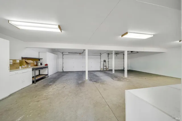 a view of a livingroom with storage and utility