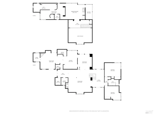 a picture of a bathroom with a white wall