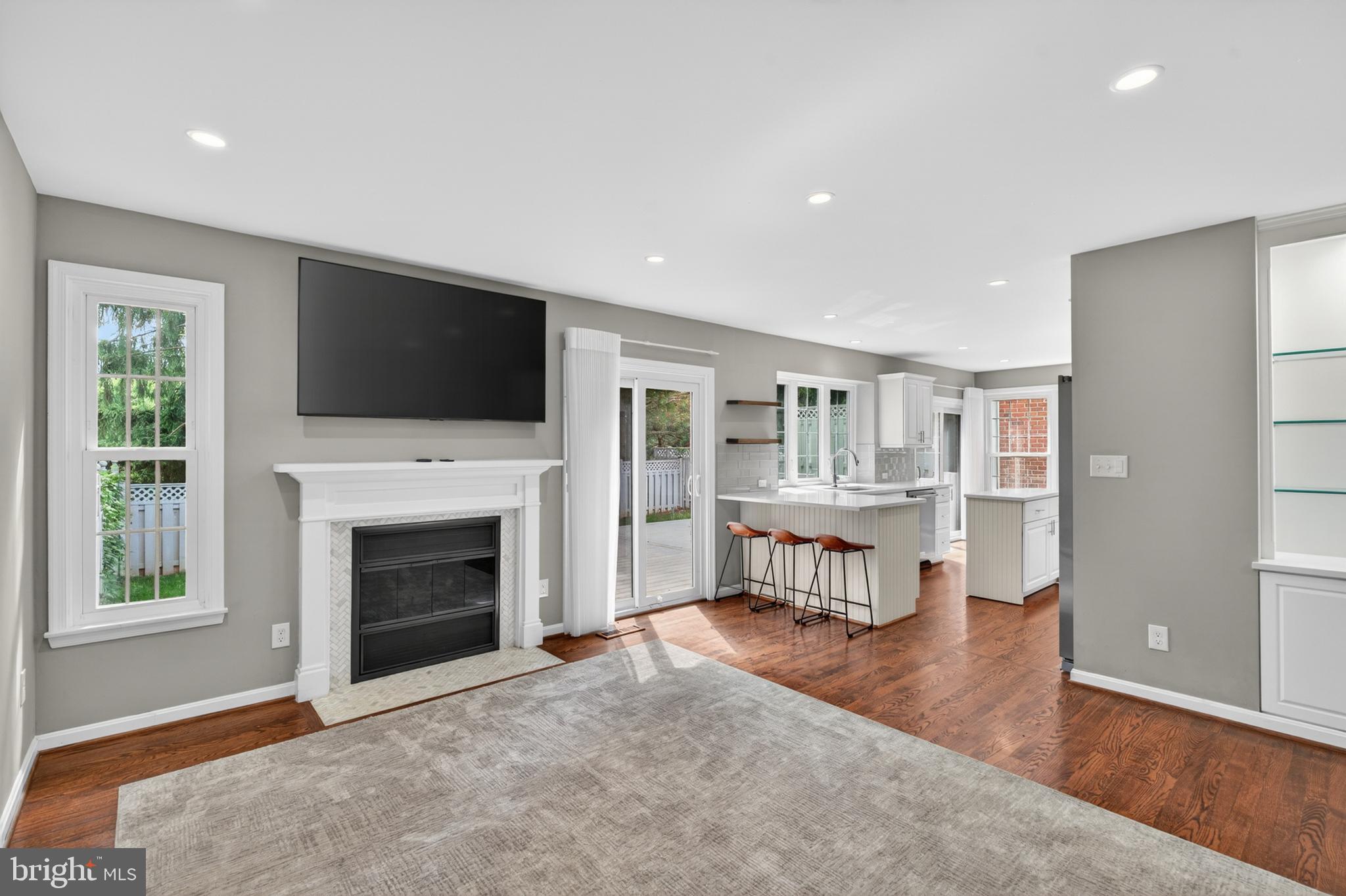 6 Nearfield Road Lutherville-Timonium, MD 21093 - Photo 27 of 71 a living room with fireplace furniture and a flat screen tv