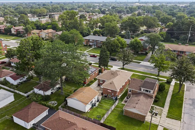 an aerial view of a house with a garden