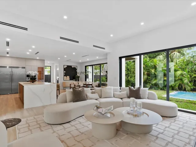 a kitchen with a table and chairs in it