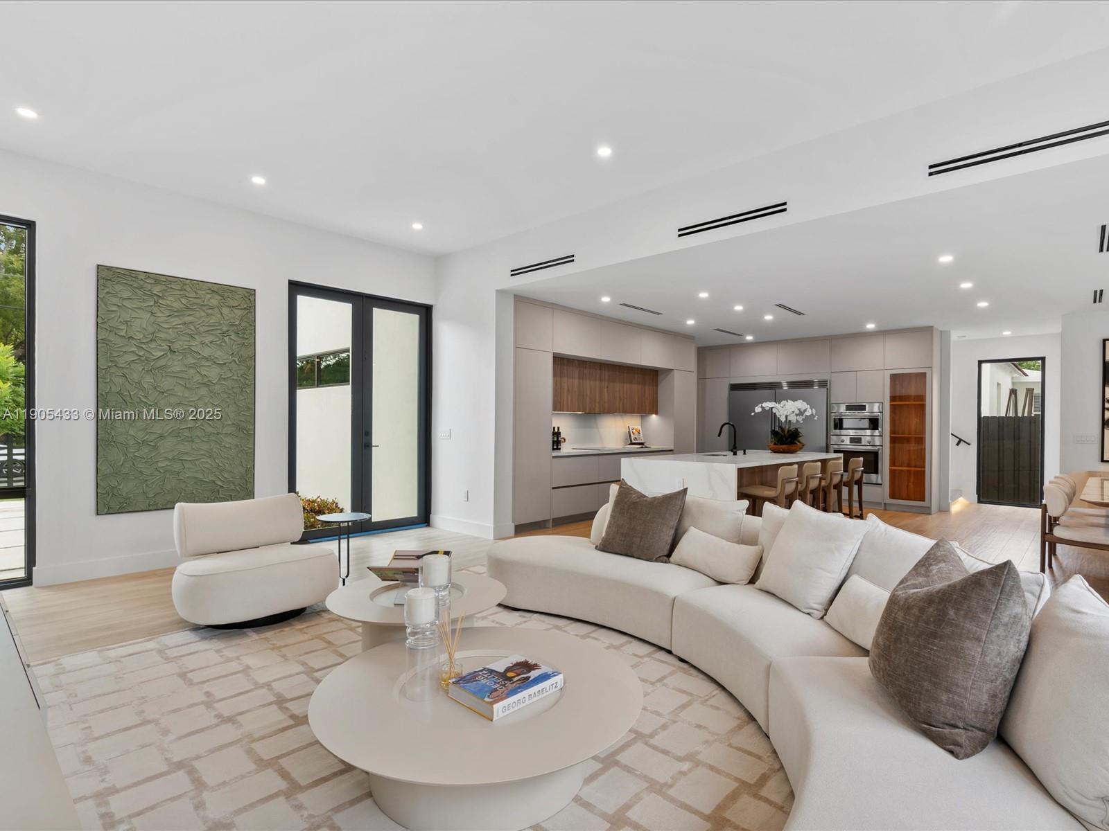 1259 Southwest 20th Street Miami, FL 33145 - Photo 18 of 61 a living room with furniture and a large window
