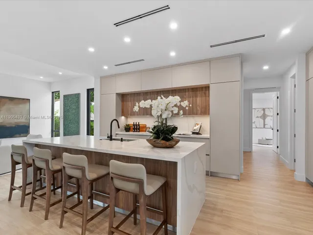 a bathroom with a toilet and a mirror