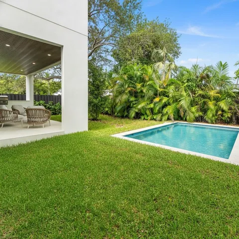 a outdoor dining space with furniture and garden