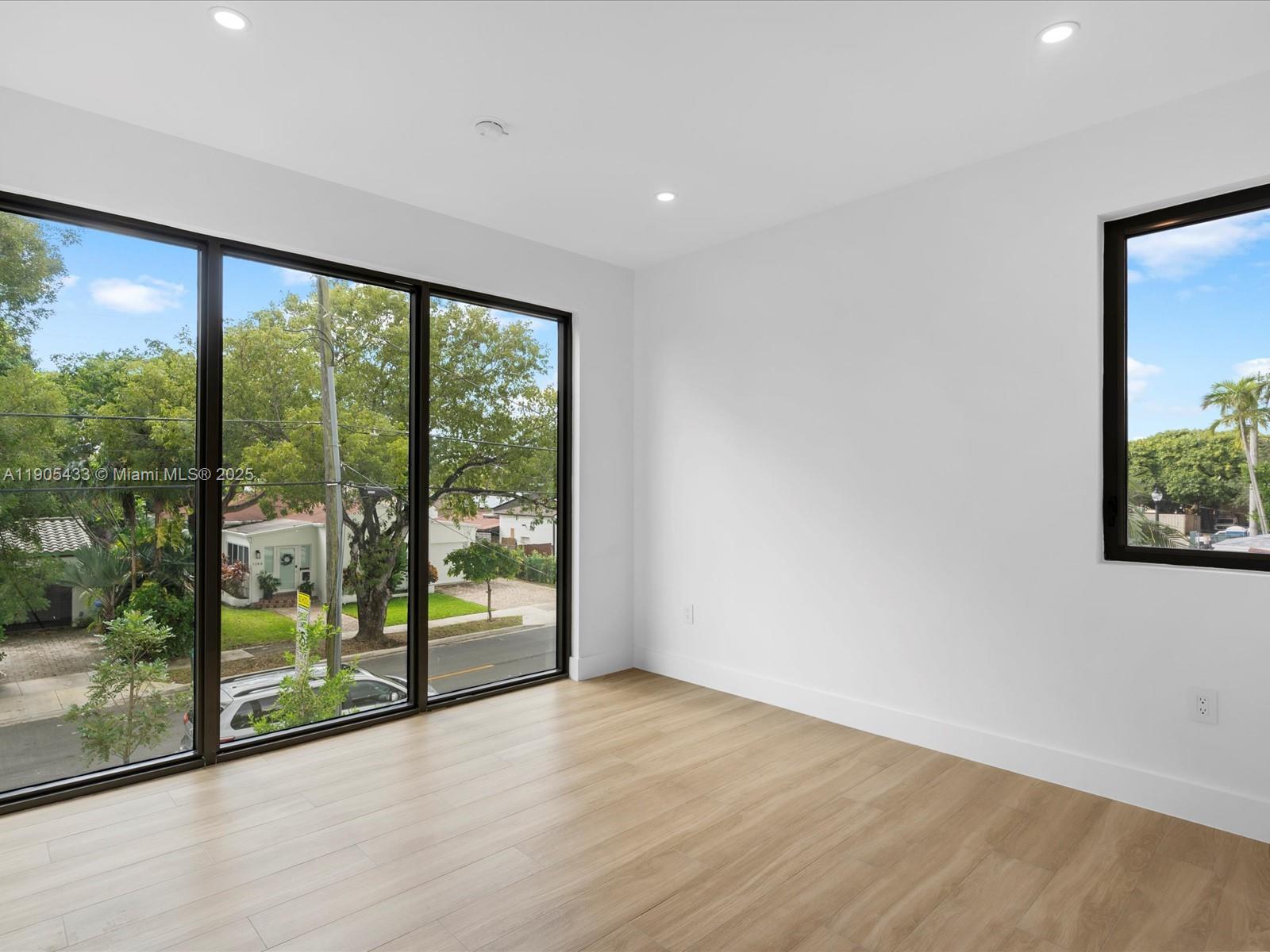 1259 Southwest 20th Street Miami, FL 33145 - Photo 55 of 61 a view of hallway with a large window