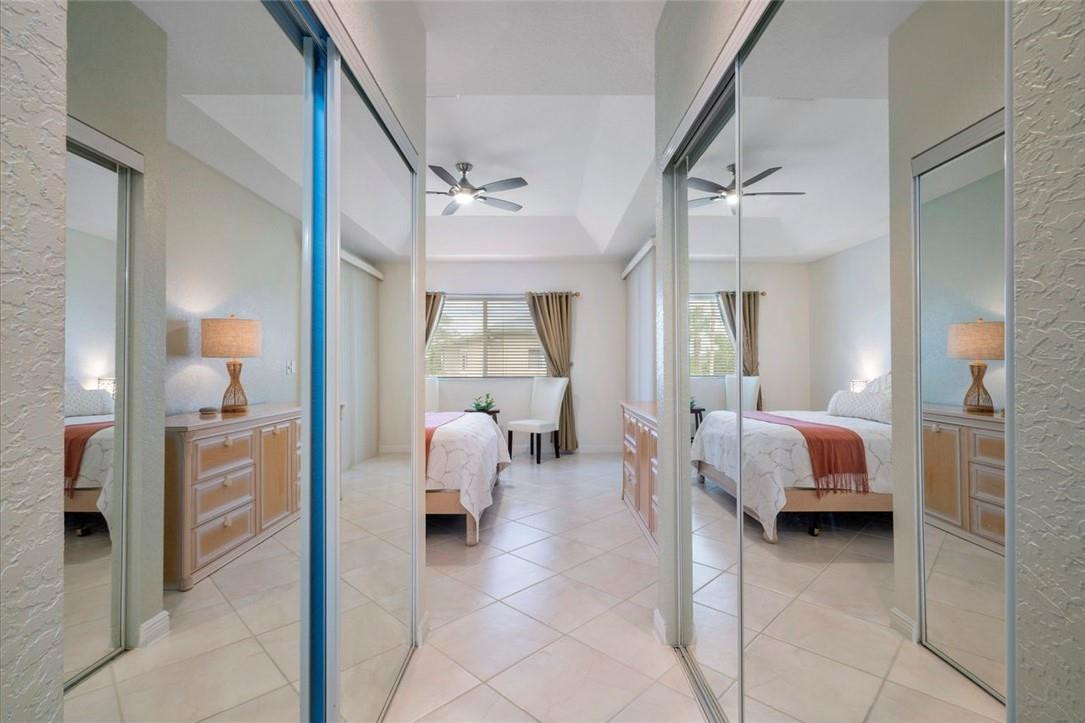 7847 Exeter Boulevard East, Unit 203 Tamarac, FL 33321 - Photo 22 of 36 a en suite bathroom with a tub and shower