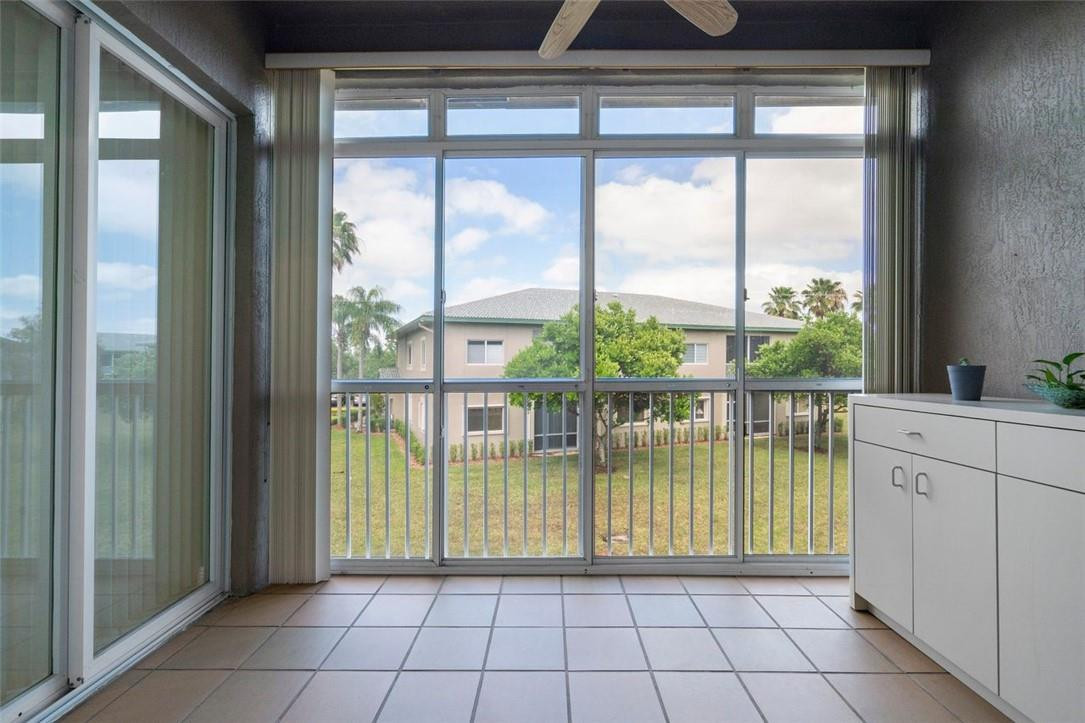 7847 Exeter Boulevard East, Unit 203 Tamarac, FL 33321 - Photo 29 of 36 a view of a kitchen from the hallway