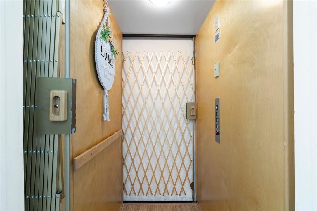 7847 Exeter Boulevard East, Unit 203 Tamarac, FL 33321 - Photo 10 of 36 a view of a bathroom with a sink and a mirror