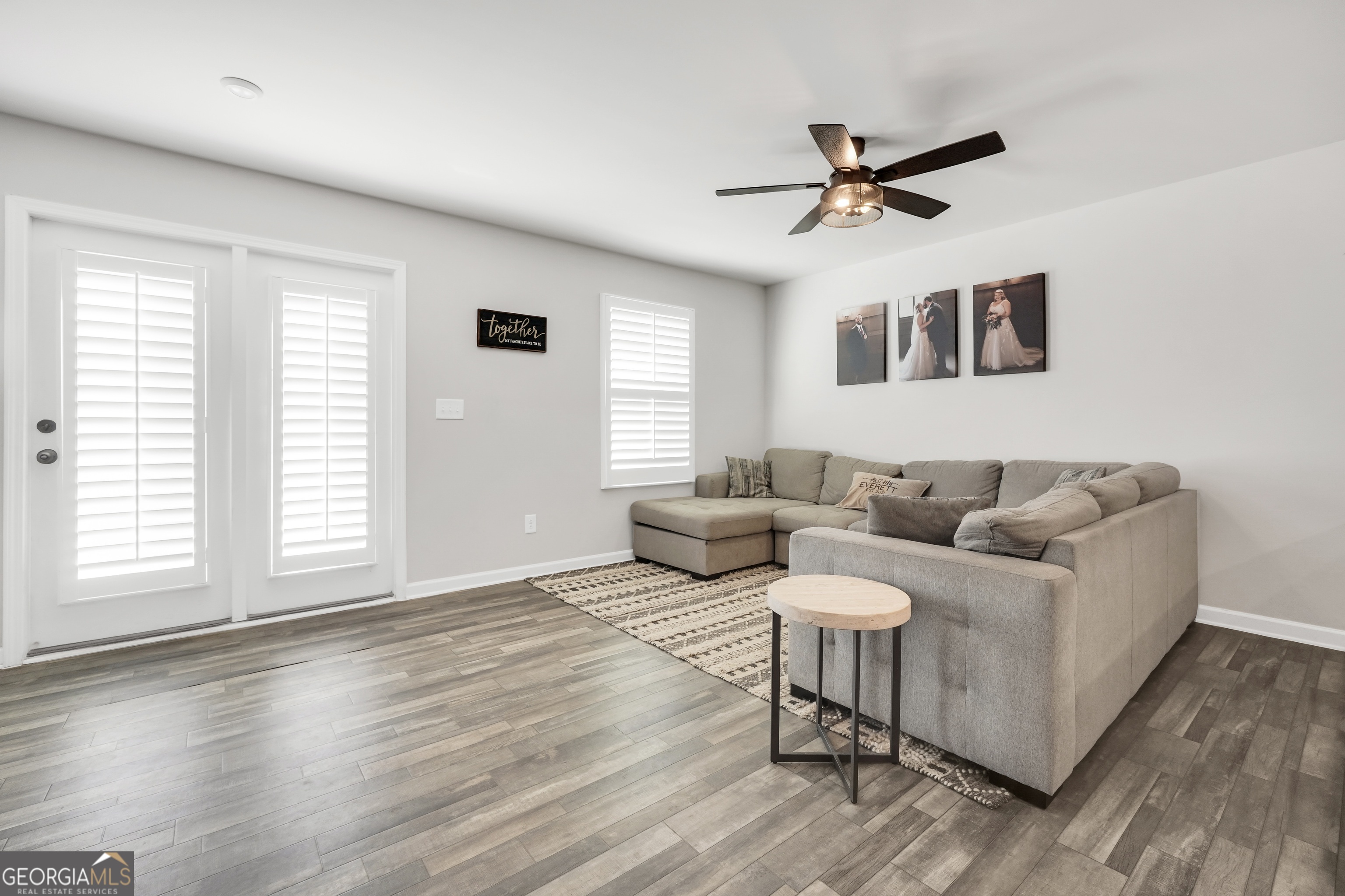 140 Catalpa Road Milner, GA 30257 - Photo 14 of 32 a living room with furniture and a window