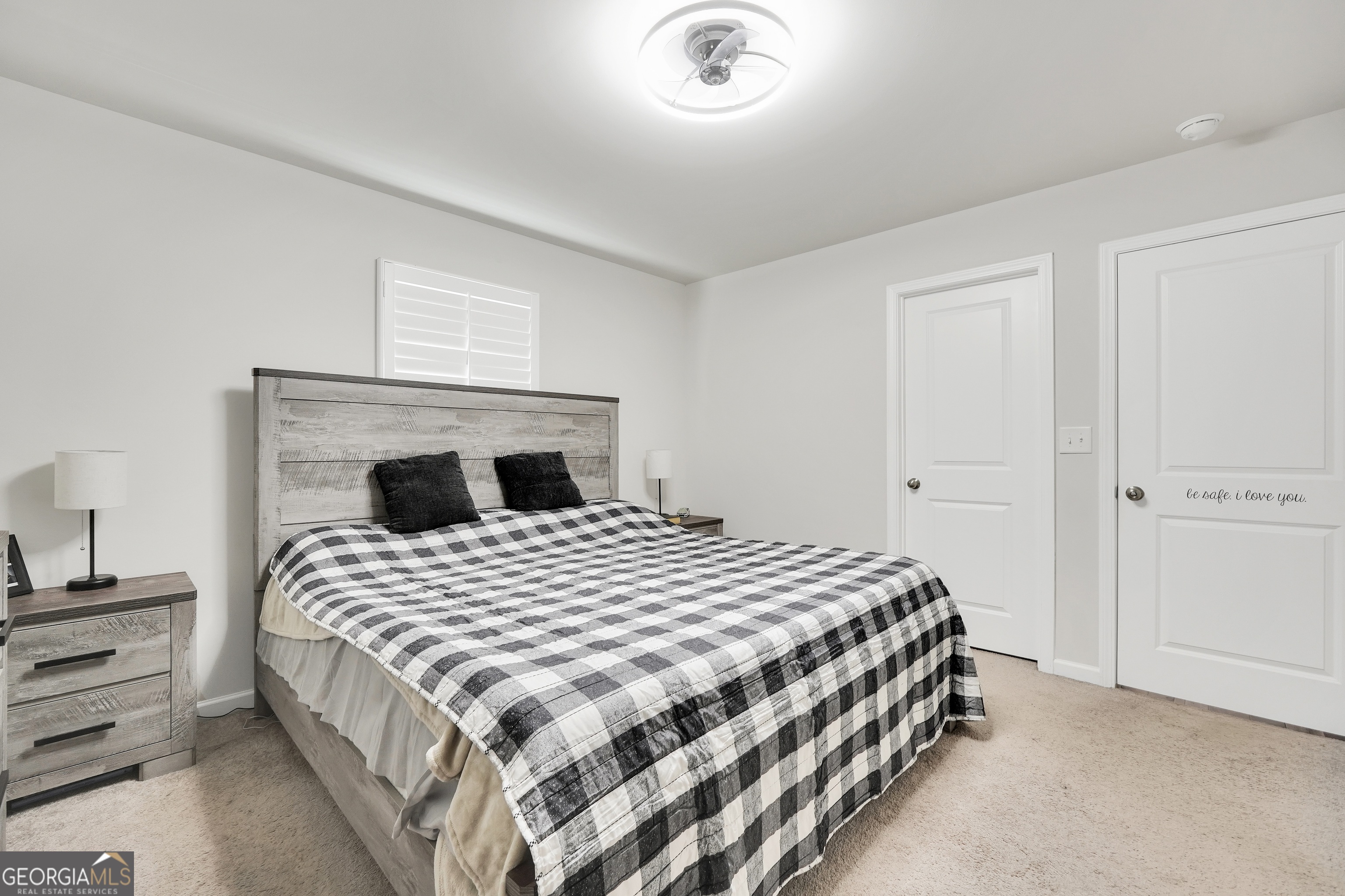 140 Catalpa Road Milner, GA 30257 - Photo 19 of 32 a bedroom with a bed and a window