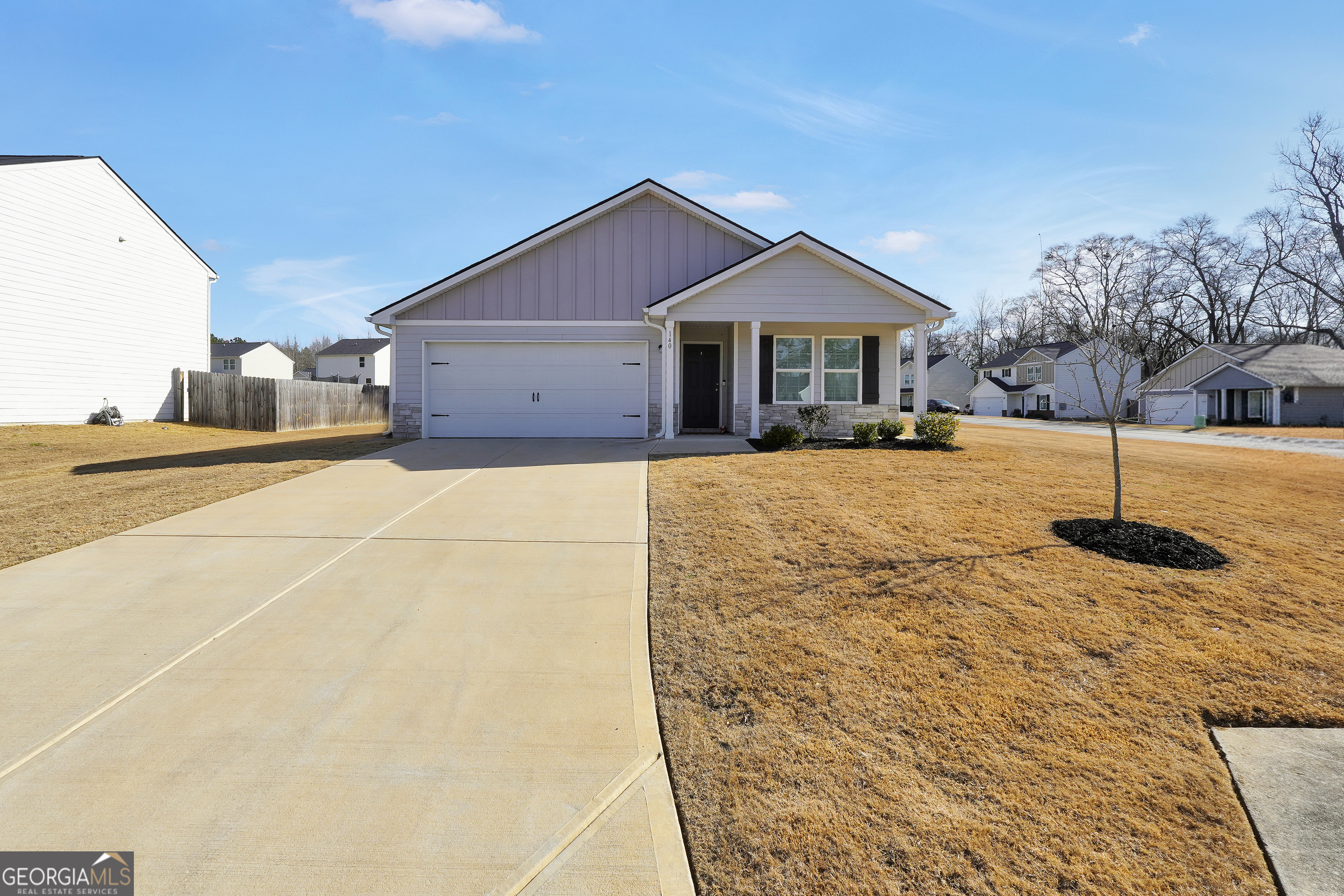 140 Catalpa Road Milner, GA 30257 - Photo 2 of 32 a front view of a house with a yard