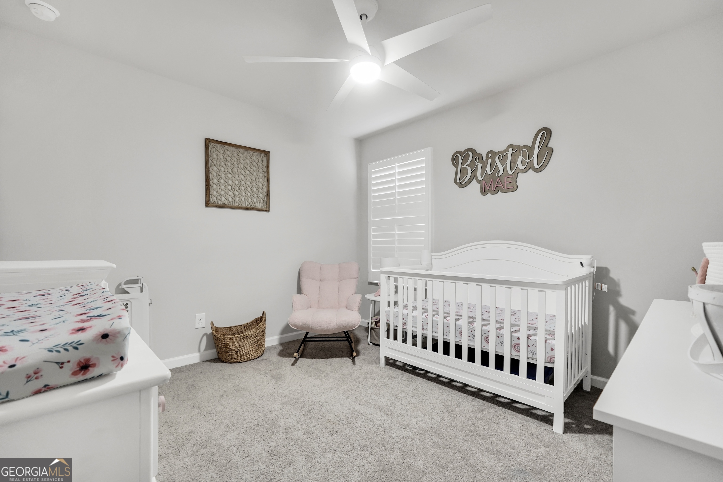 140 Catalpa Road Milner, GA 30257 - Photo 25 of 32 a bedroom with a bed and a window