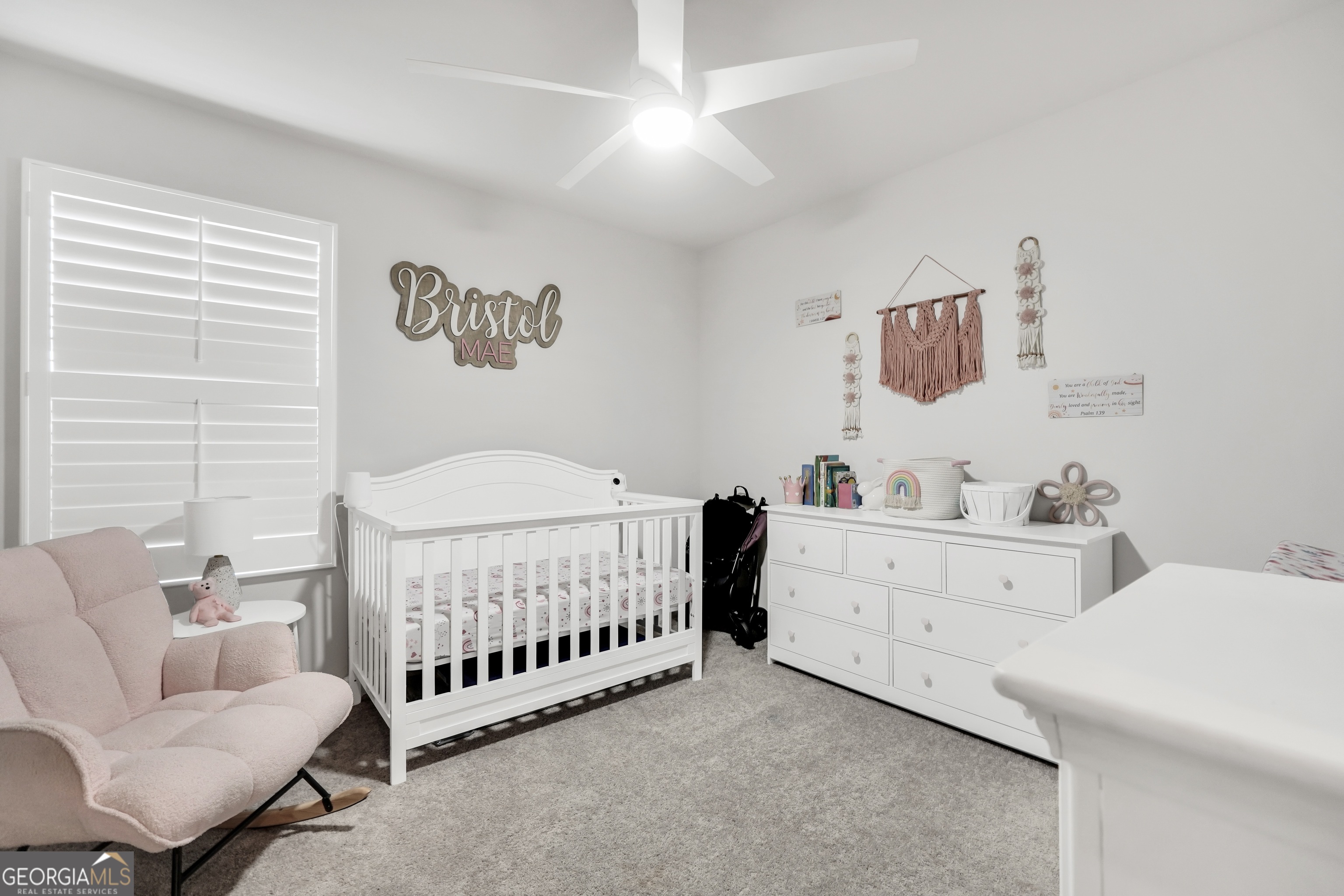 140 Catalpa Road Milner, GA 30257 - Photo 26 of 32 a bedroom with a bed and a couch