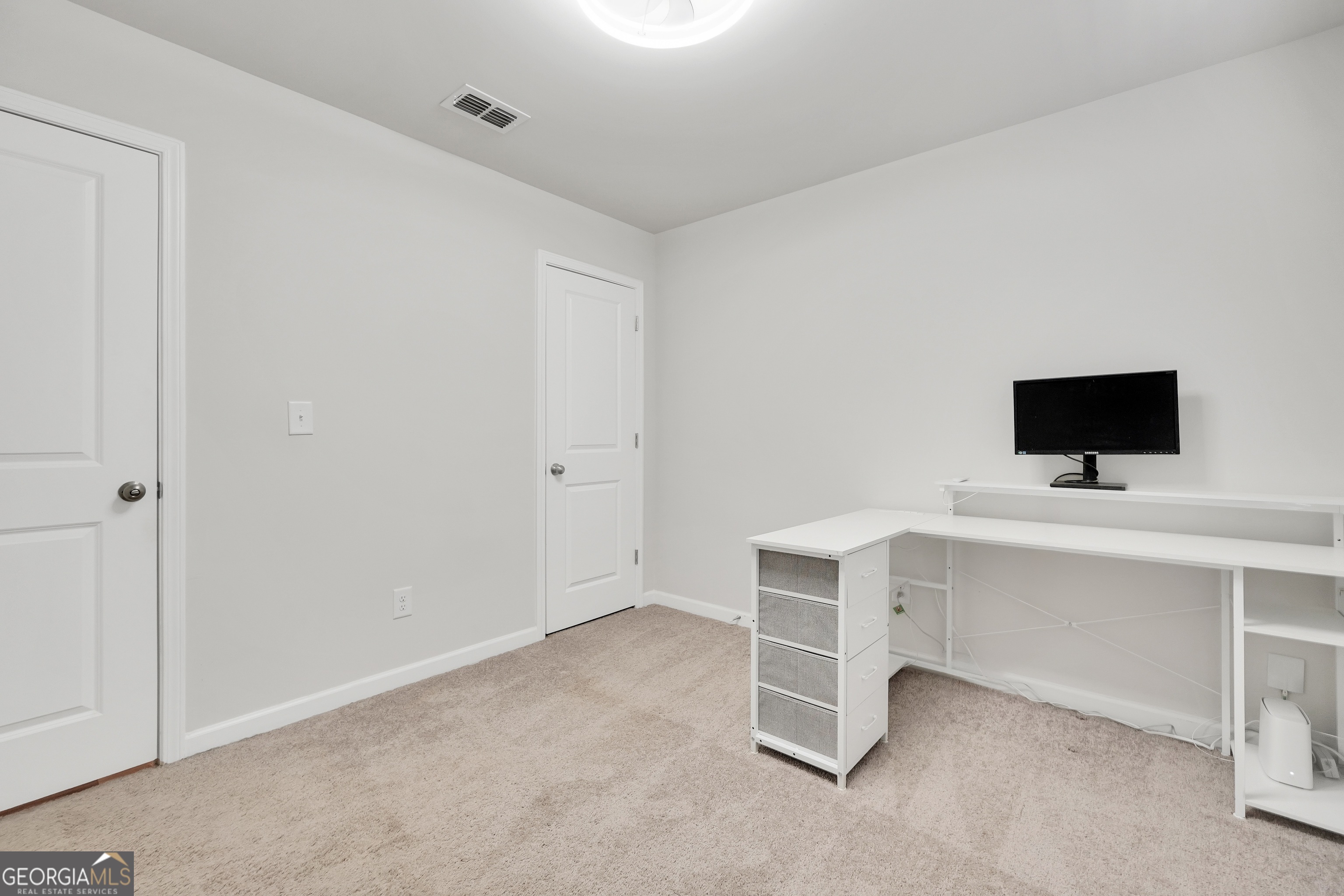 140 Catalpa Road Milner, GA 30257 - Photo 30 of 32 a view of an empty room