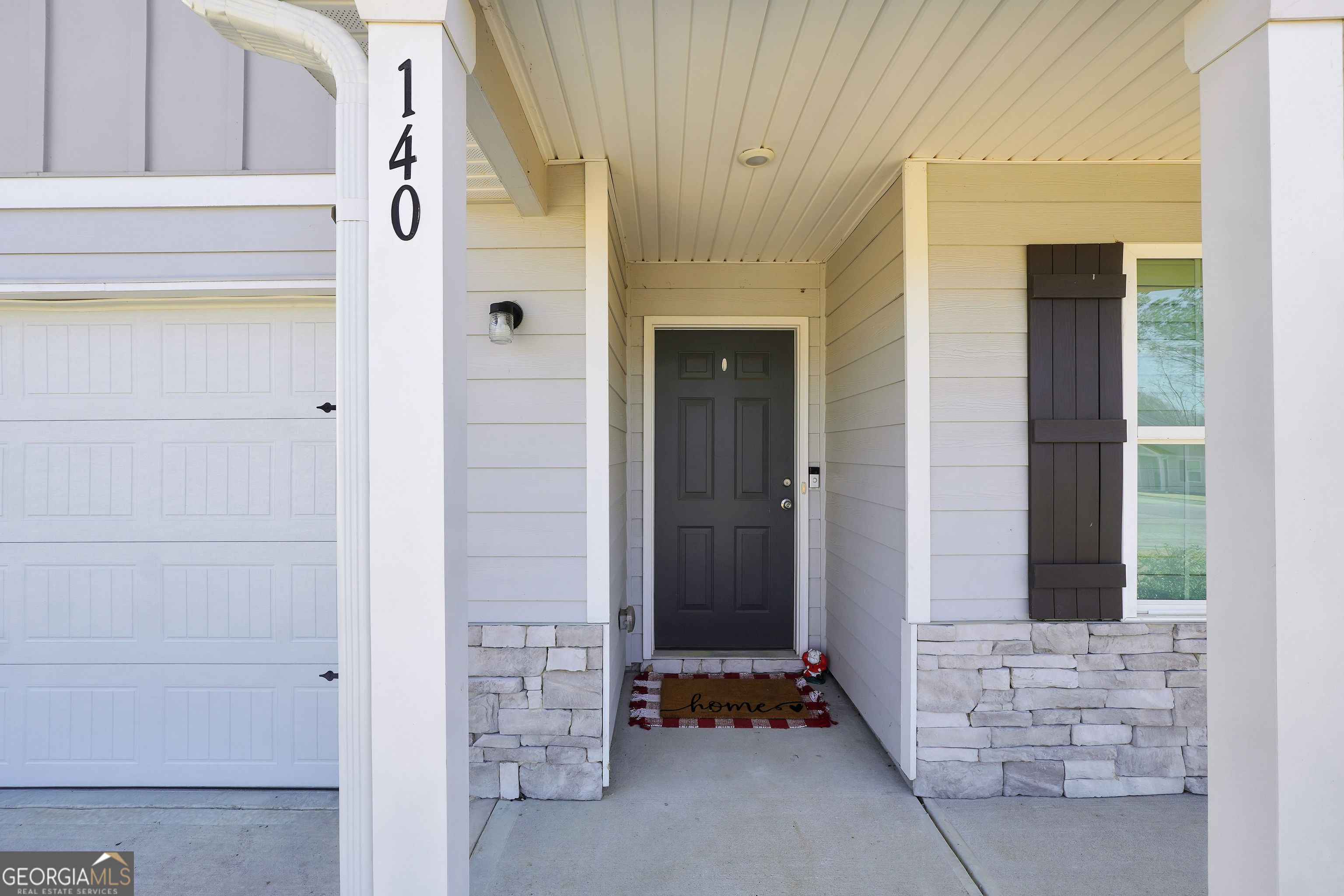 140 Catalpa Road Milner, GA 30257 - Photo 6 of 32 a view of front door of house