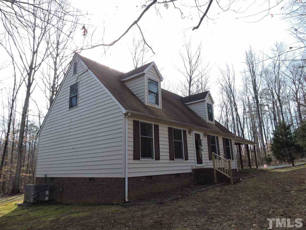 250 Kiser Hicks Road Roxboro, NC 27574 - Photo 1 of 19 a view of a house with a yard